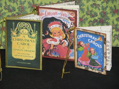 three children's books sitting on top of a table