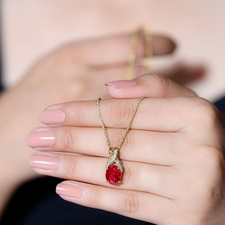 Product Details Introducing a one-of-a-kind Created Ruby Pendant Necklace that is both delicate and charming. The 8X10 MM Oval Cut Created Ruby takes center stage in a 4 Prong Setting, with a Twisted Bail adorned with Diamond on a Solitaire Pendant. This Designer Pendant is so beautiful that its likely to become a staple in your collection, one youll never want to take off. Product Information SKU SHP-PENDANT032215345 Weight 3.60 gm (Approximate) LAB CREATED RUBY INFORMATION No.of Stones 1 Pieces Total Weight 4.00 Carat (Approximate) Dimension(approx) Oval-8X10 mm-1 Pcs Color Red Cut Brilliant Shape Oval Setting Type 4-Prong-Setting Quality Grade AAAA DIAMOND INFORMATION No.of Stones 17 Pieces Total Weight 0.17 Carat (Approximate) Dimension(approx) Round-1.10X1.10 mm-16 PcsRound-1X1 mm-1 P Luxury Jewelry With Rose Cut Diamonds And Lab-created Ruby, Luxury Rose Cut Diamond Jewelry With Lab-created Ruby, Ruby Pendant Necklace, Galaxy Stuff, Mangal Sutra, Oval Setting, Ruby Necklace Pendant, Diamond Jewelry Set, Ruby Pendant