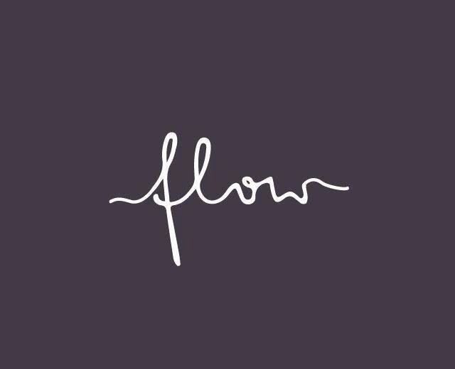 the word flow written in cursive writing on a dark background with white ink