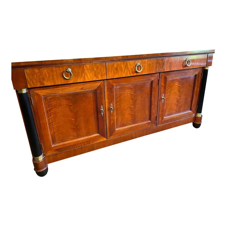 a large wooden cabinet with two black handles