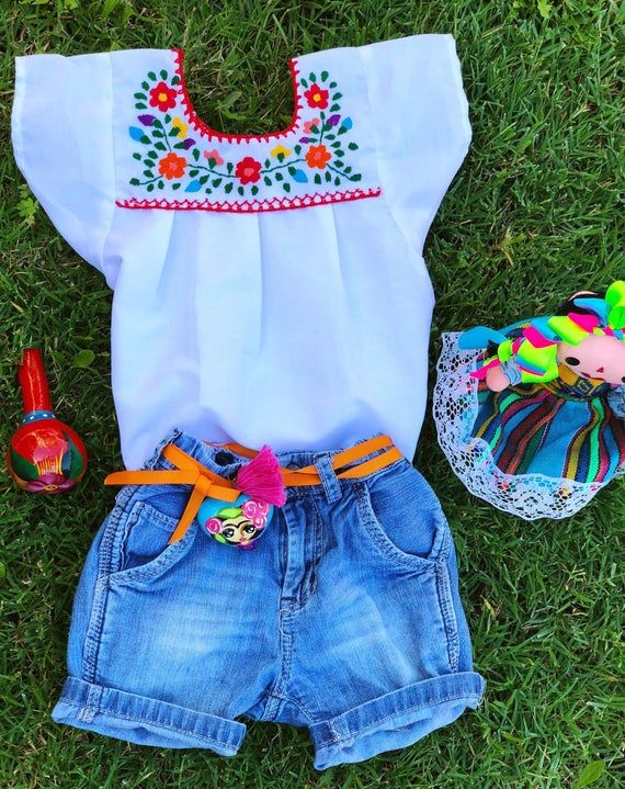 Beautiful Hand Floral Embroidered Tops🌸 Available Sizes from 12 m to 8 Years old. Color : White (Colorful Flowers) Size: 12-18 Months Length : 13 / 34 cm Chest: 8”/23 cm Width: 11/ 28 cm Note: Each Top is hand Embroidered Flowers colors variety. Includes Top Only. Mommy Matching Shirt Available Mexican Outfit Party, Mexican Birthday Party, Taco Twosday, White Mexican, Mexican Birthday Parties, Embroidered Tops, Mexican Birthday, Mexican Blouse, Fiesta Outfit