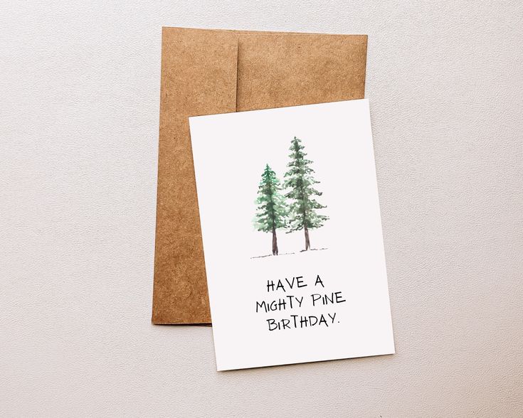 there is a card that says have a mighty pine birthday on the front and back