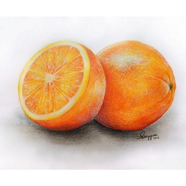 a drawing of two oranges with one cut in half