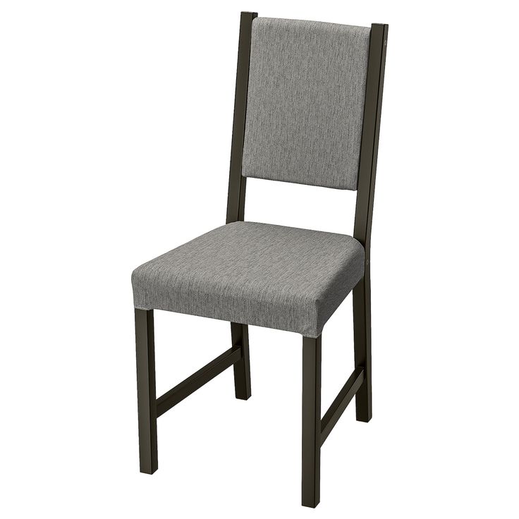 a gray chair sitting on top of a white floor