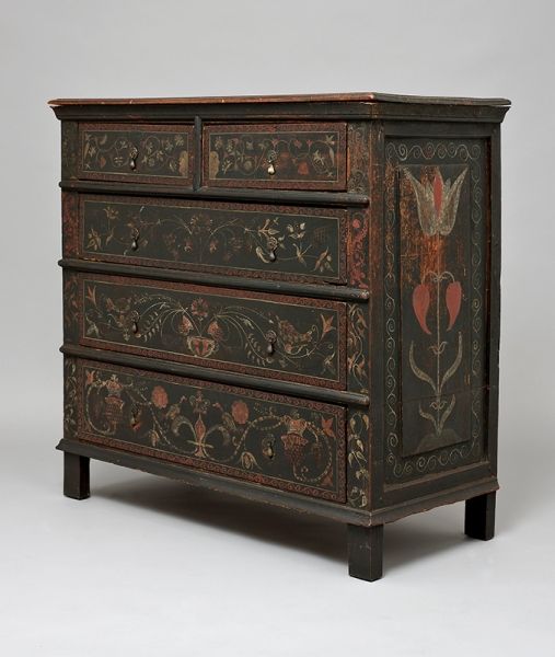 an old dresser with painted flowers and birds on it's drawers, possibly from the early 19th century