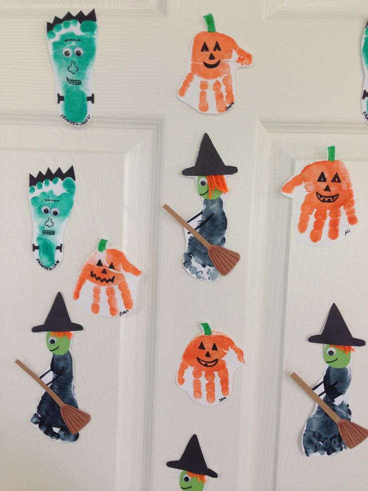 handprinted halloween decorations on the front door