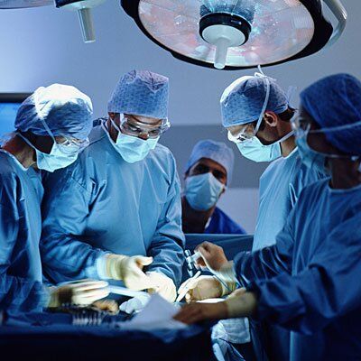 doctors performing surgery in an operating room