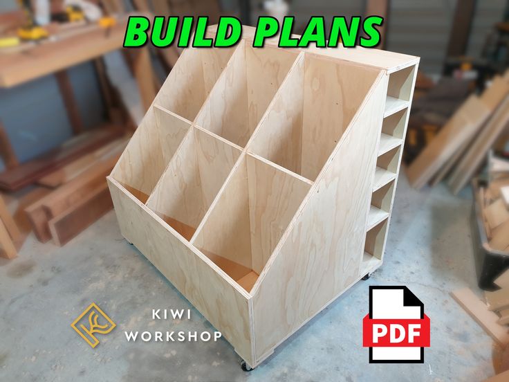 a wooden box with multiple compartments in it and the words build plans above it that says kiwi workshop