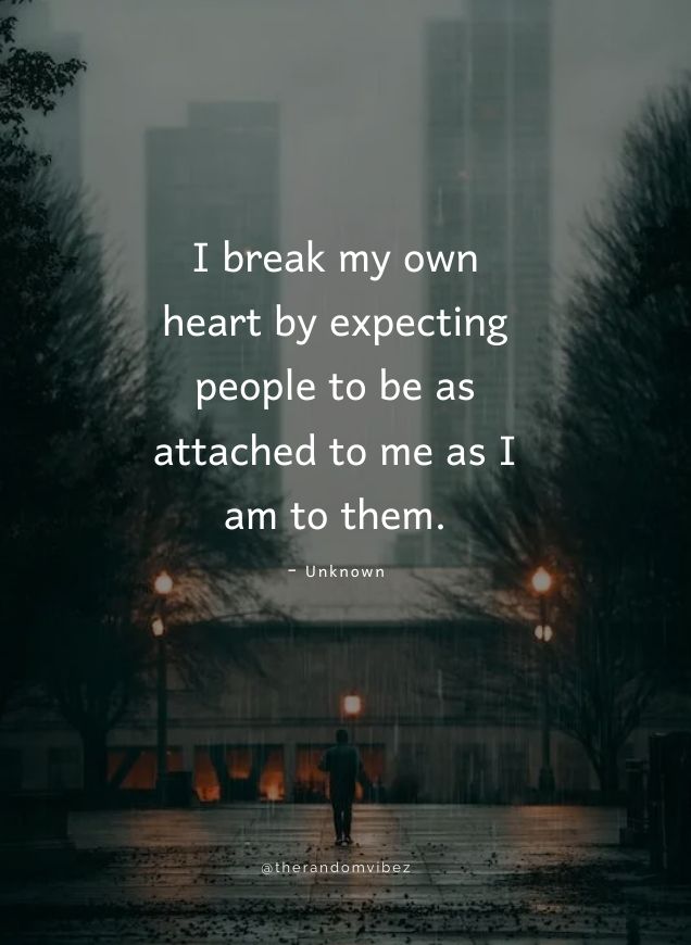 a person walking down a street in the rain with a quote on it that reads, i break my own heart by expecting people to be as attached to me as i am to them