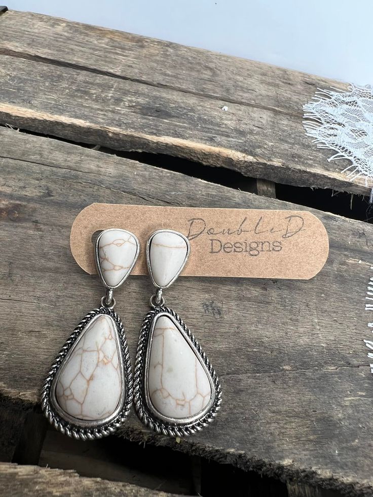 Add a western vibe to your next outfit with these amazing natural stone earrings! Vintage Natural Stone Earrings, Western Style Dangle Earrings For Pierced Ears, Vintage Earrings With Natural Stones, Southwestern White Teardrop Earrings, Handmade Western Dangle Earrings, Silver Western Style Earrings, Southwestern White Drop Earrings, Bohemian White Earrings With Natural Stones, White Bohemian Earrings With Natural Stones