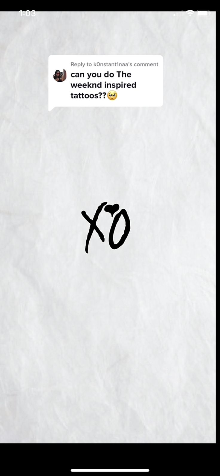 an xo sticker on a piece of paper