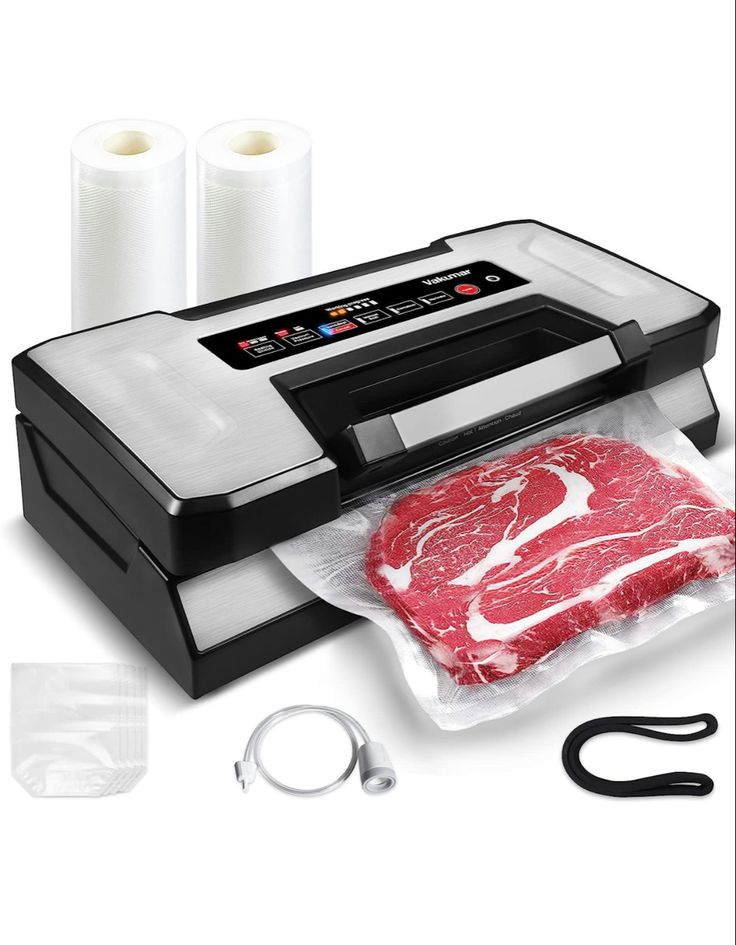 an image of a meat vacuumer with two rolls of food in front of it