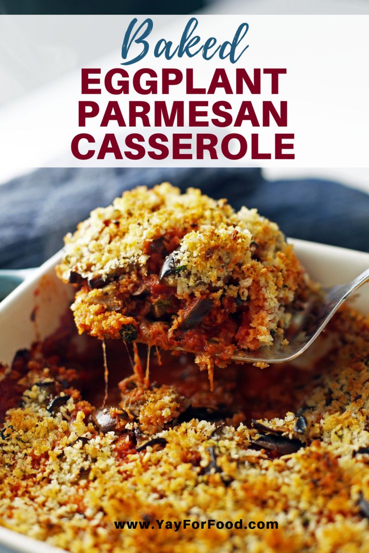 baked eggplant parmesan casserole in a white dish with a spoon