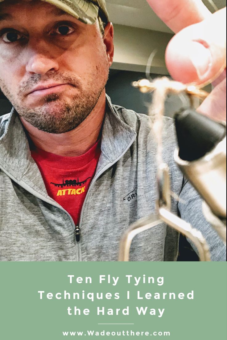 a man in a hat is holding something up to his face with the caption ten fly tying techniques i learned the hard way