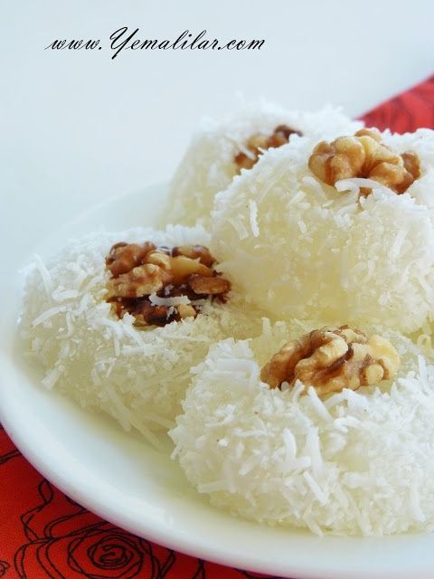 three pieces of coconut cake on a plate