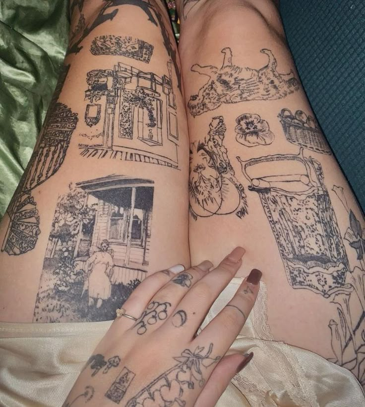 two women's legs with tattoos on them, both showing the same image as they are