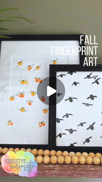 an art project is being displayed in front of a wall with birds on it and the words fall fingerprint art