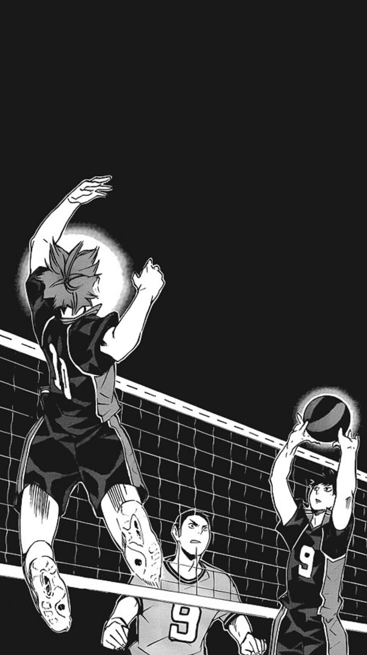 two people playing volleyball in front of a net