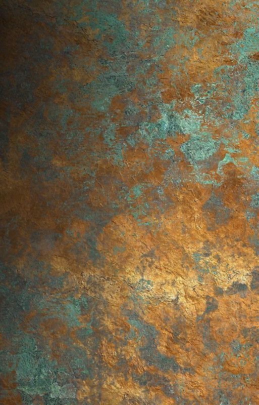 a rusted metal surface with green and gold paint