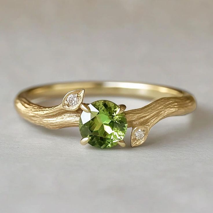 *Ethically Sourced Sapphire, crafted with care and conscience for the conscious wearer. Each piece is handcrafted with 10k/14k/18k gold / platinum / silver in your choice. *Gem: Green Peridot 5mm, Moissanite 1.5mm **PERIDOT The stone of compassion. Peridot is believed to bring good health, restful sleep and peace to relationships by balancing emotions and mind. This friendly bright green stone also has the uncanny ability to inspire eloquence and creativity, it also brings delight and good cheer Luxury Elegant Green Cluster Ring, Luxury Green Engraved Ring, Unique Engagement Rings Peridot, Luxury Peridot Birthstone Ring With Accent Stones, Luxury Green Peridot Diamond Ring, Raw Peridot Ring, Luxury Peridot Three-stone Rings, Green Peridot Rings With Nature-inspired Style, Nature-inspired Peridot Rings As Gift