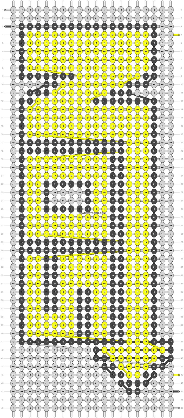 an image of a yellow and black object with dots on the bottom half of it