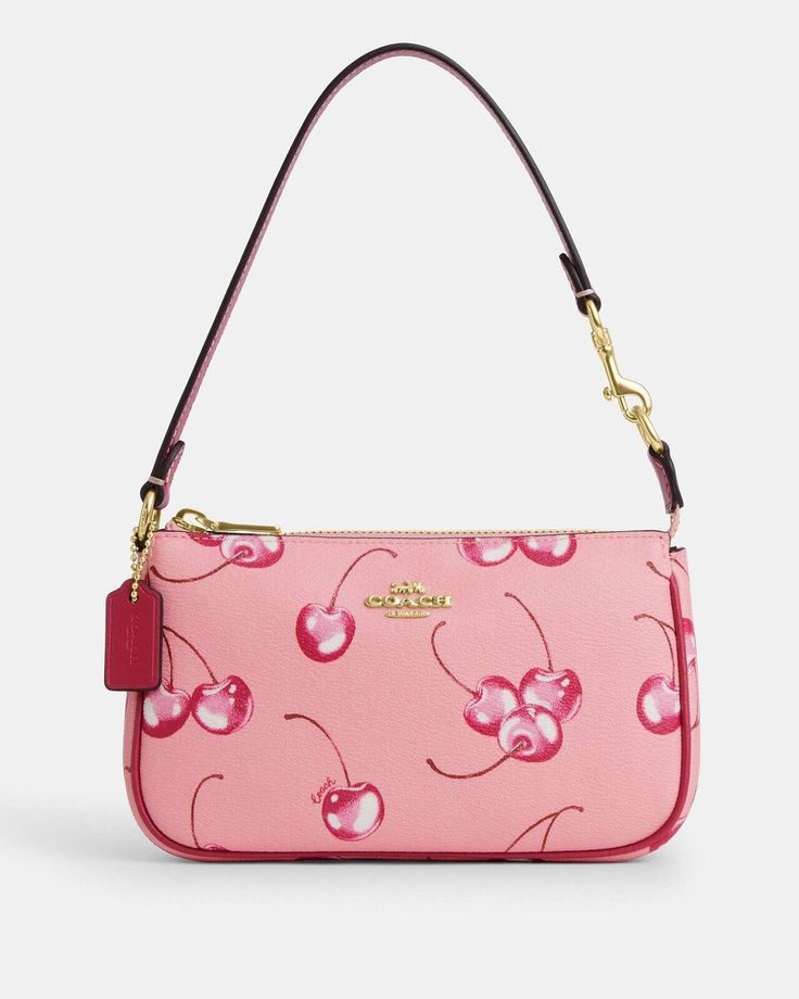 Coach Nolita 19 With Cherry Print Color: Flower Pink Original PACKAGING LIMITED EDITION 100% Authentic Brand new with tags Additional Details Measurements Length: 7.5" Height: 4.5" Width: 2.0" Materials Printed coated canvas and smooth leather Features Inside multifunction pocket Two credit card slots Zip-top closure Chain handle with 6 1/4" drop Style Number CR827 Same day shipping Cherry Coach Purse, Cherry Coach Bag, Coach Cherry Bag, Couch Purses, Coach Nolita 19, Coach Nolita, Nolita 19, Bag Boutique, Sustainable Bag