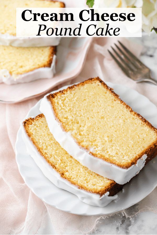 two slices of cream cheese pound cake on white plates with flowers in the background and text overlay