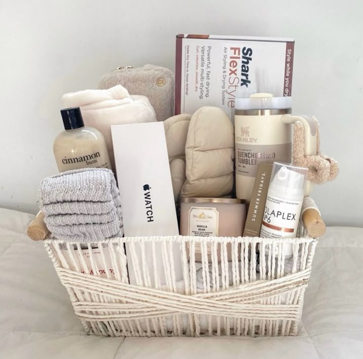 a basket filled with personal care items on top of a bed