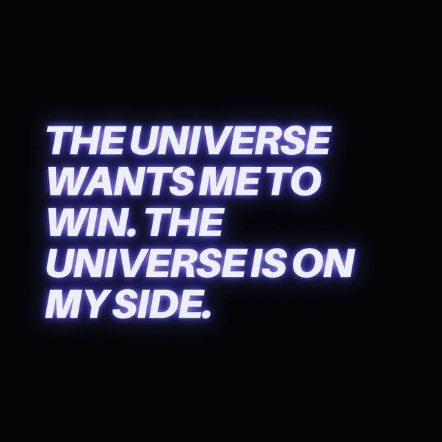 a neon sign that says the universe wants me to win the universe is on my side