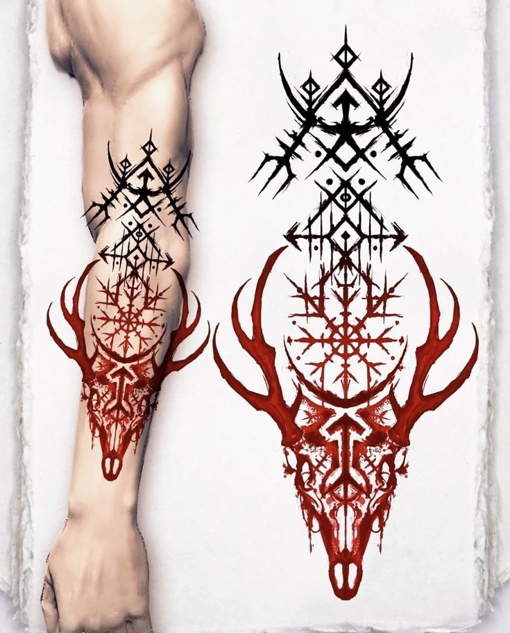 an artistic tattoo design on the leg of a person with red ink and black designs