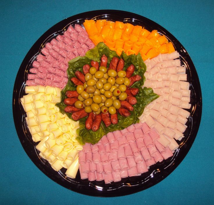 a platter filled with lots of different types of food