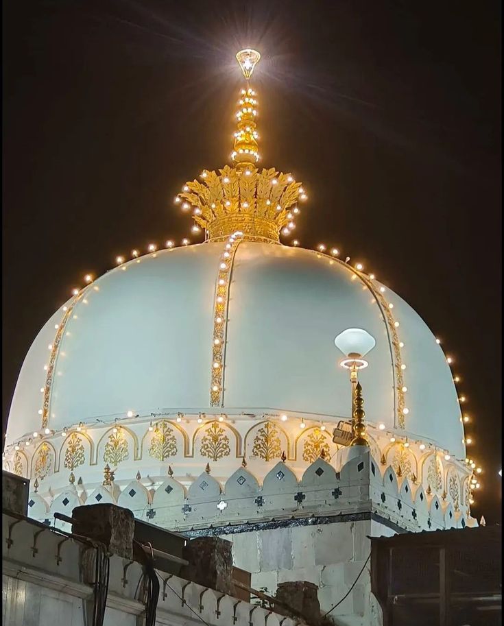 a white dome with lights on top of it