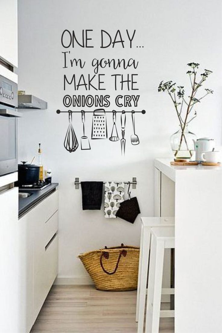 a kitchen with a wall sticker that says one day i'm gone to make the onions cry