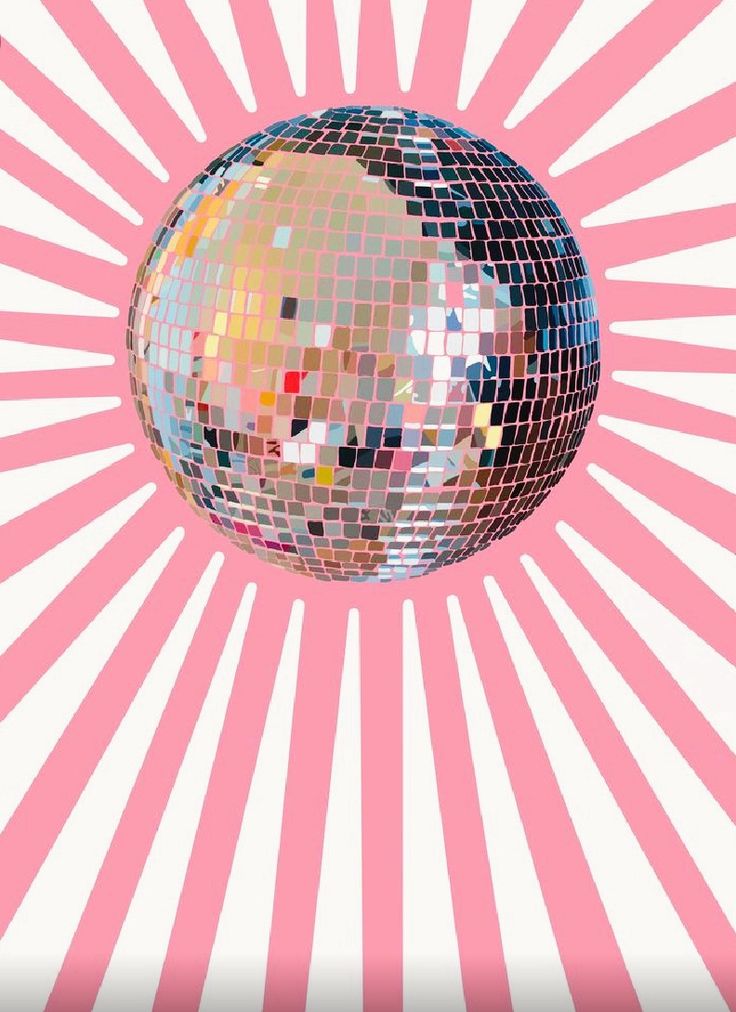 a disco ball with pink and white stripes in the background