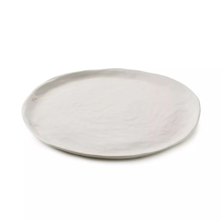 a white plate on a white background