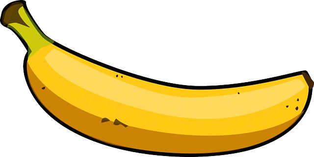 a yellow banana sitting on top of a white surface