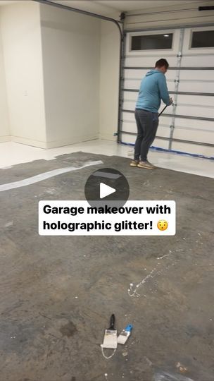 a man standing in an empty garage holding a paint roller with the words garage makeover with holographic glitter