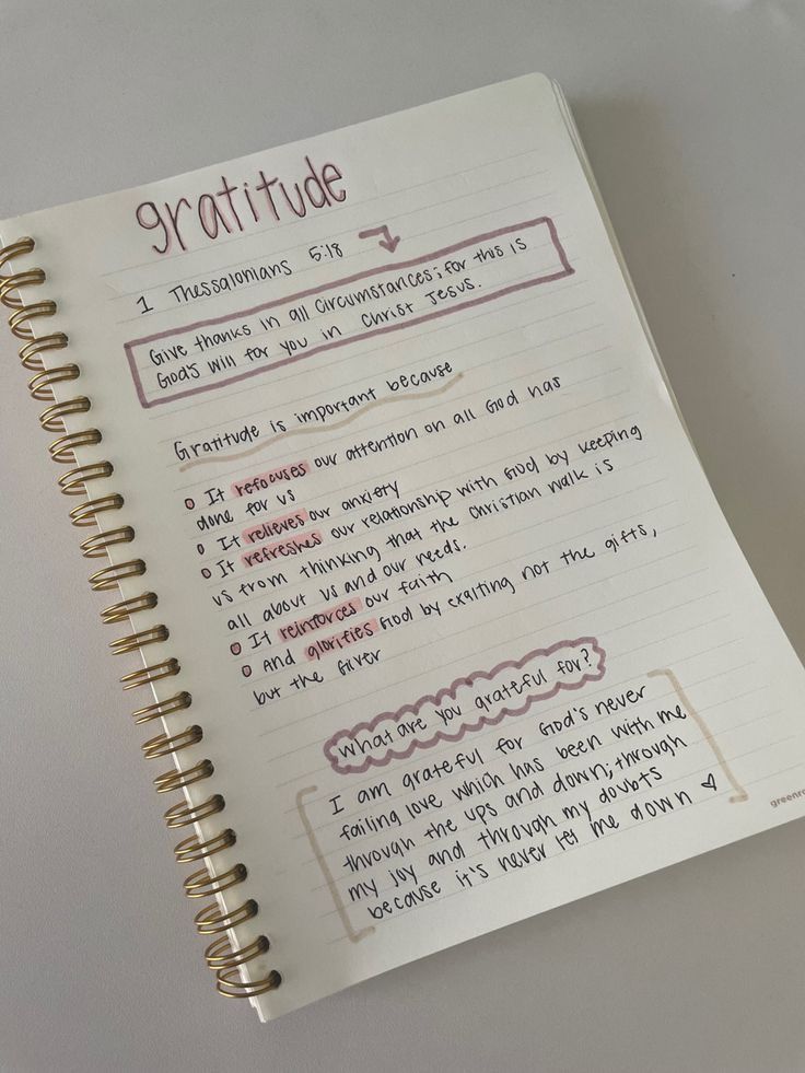 an open notebook with writing on it