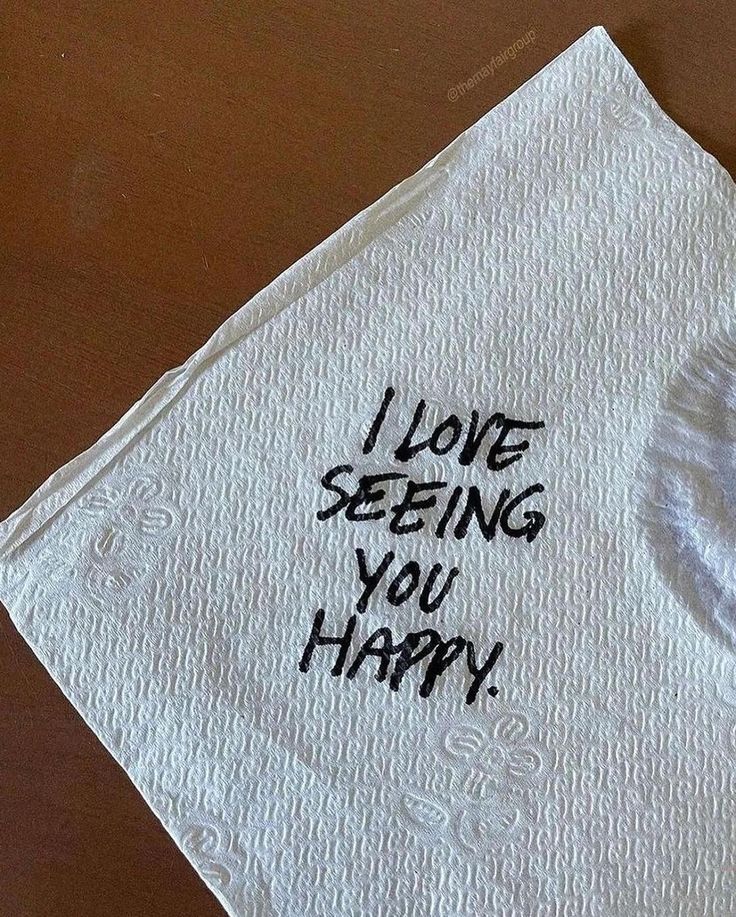 a napkin with the words i love seeing you happy written on it