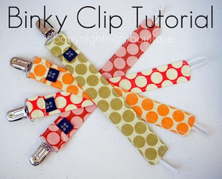 the pink, orange and yellow polka dot fabric clip holders are arranged on top of each other