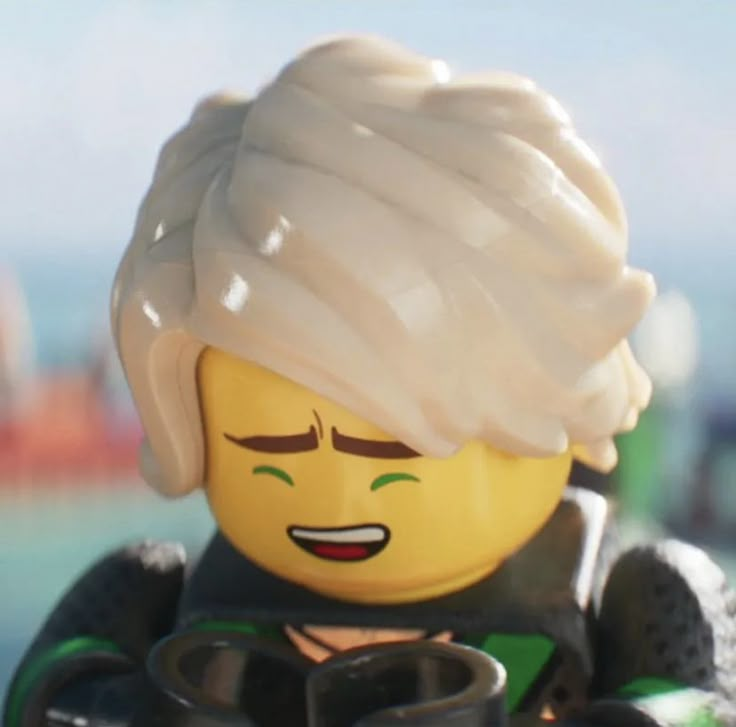 a lego man with a white hair and green eyes