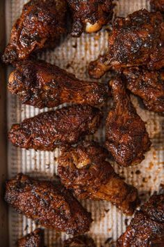 chicken wings on a baking sheet ready to be cooked in the oven for dinner time