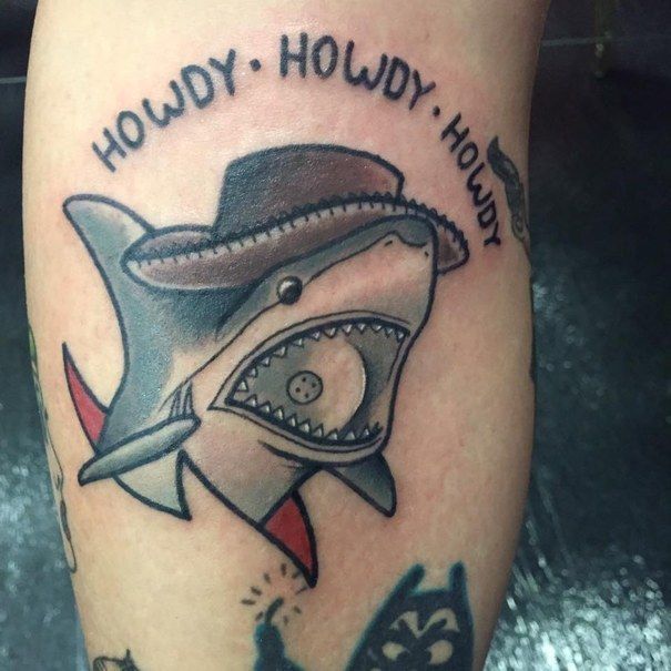 a shark with a hat on it's head and the words hodgy - ho