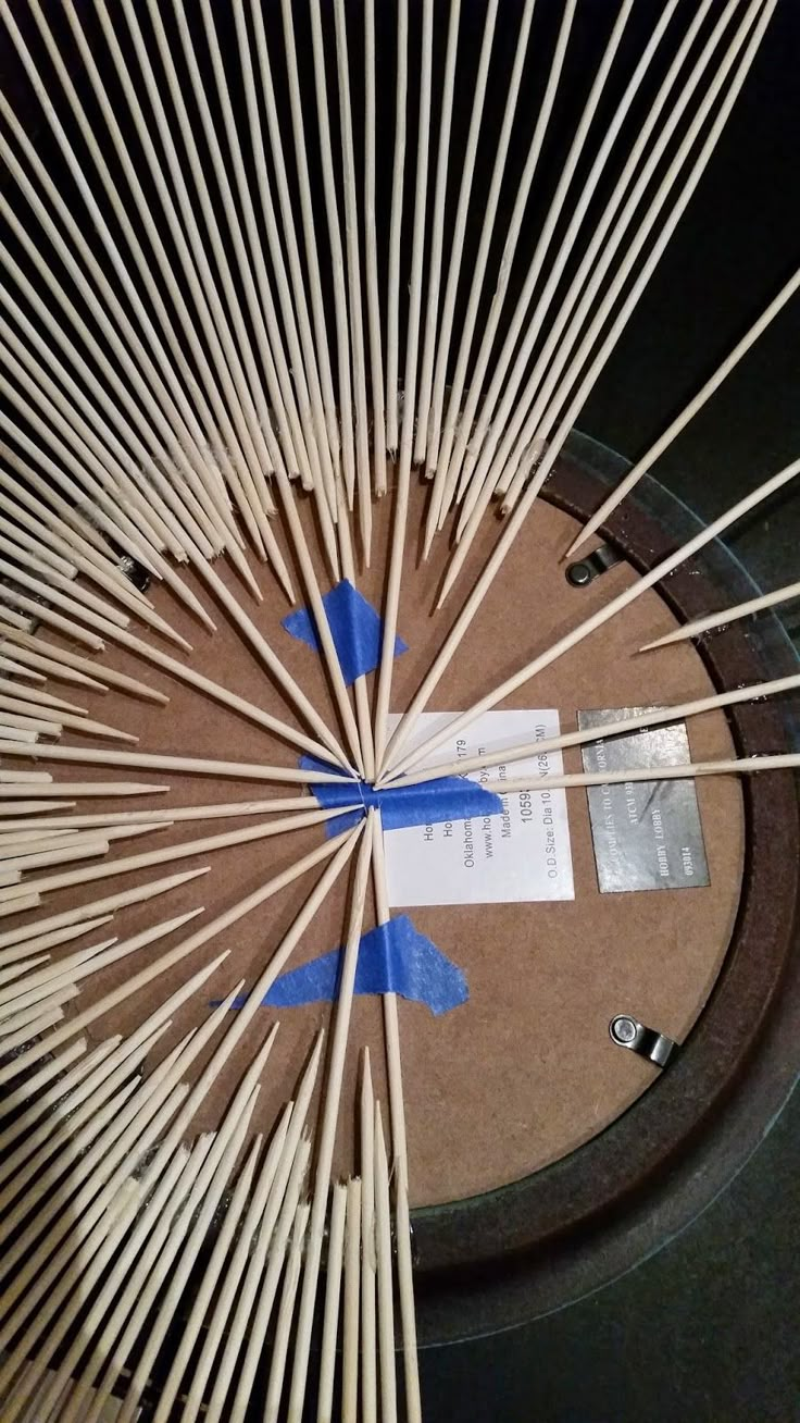 a group of wooden sticks sitting on top of a table