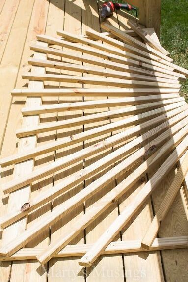 a wooden bench made out of wood planks