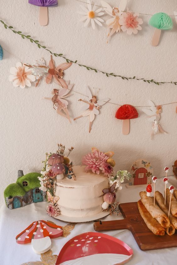 there is a cake and other decorations on the table