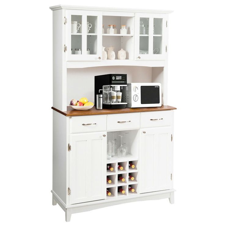 a white kitchen hutch filled with food and drinks