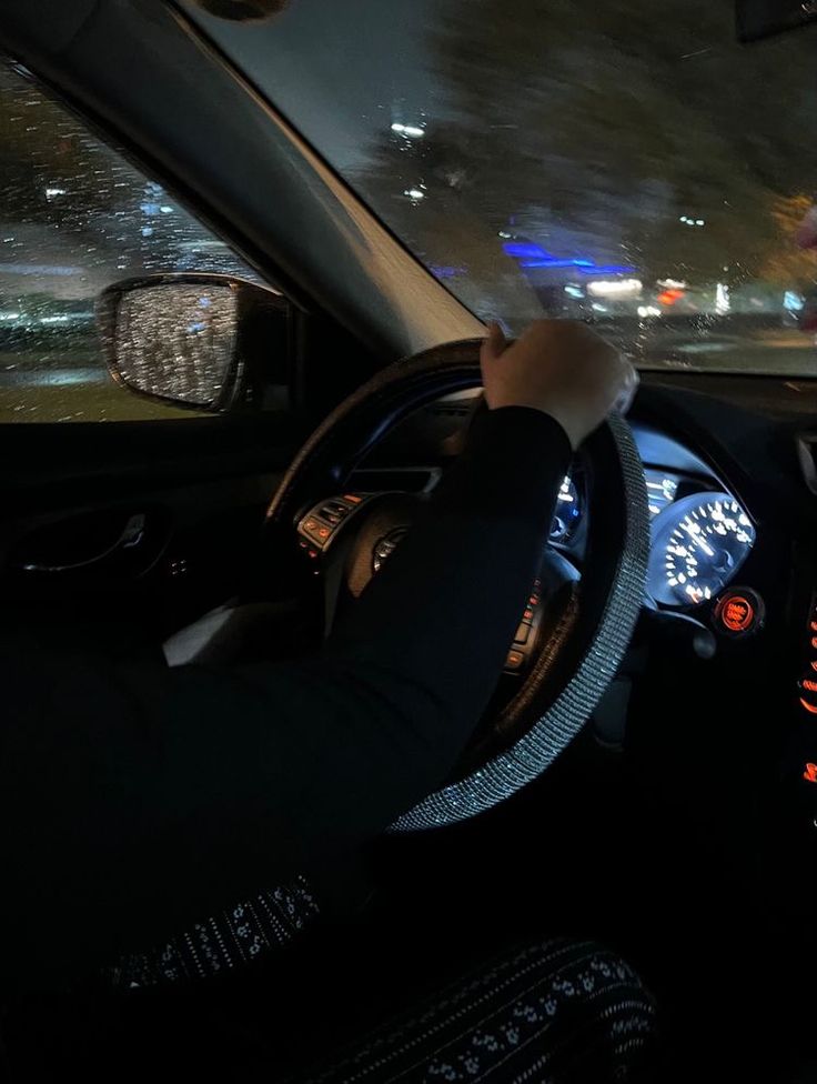 the driver is driving his car at night