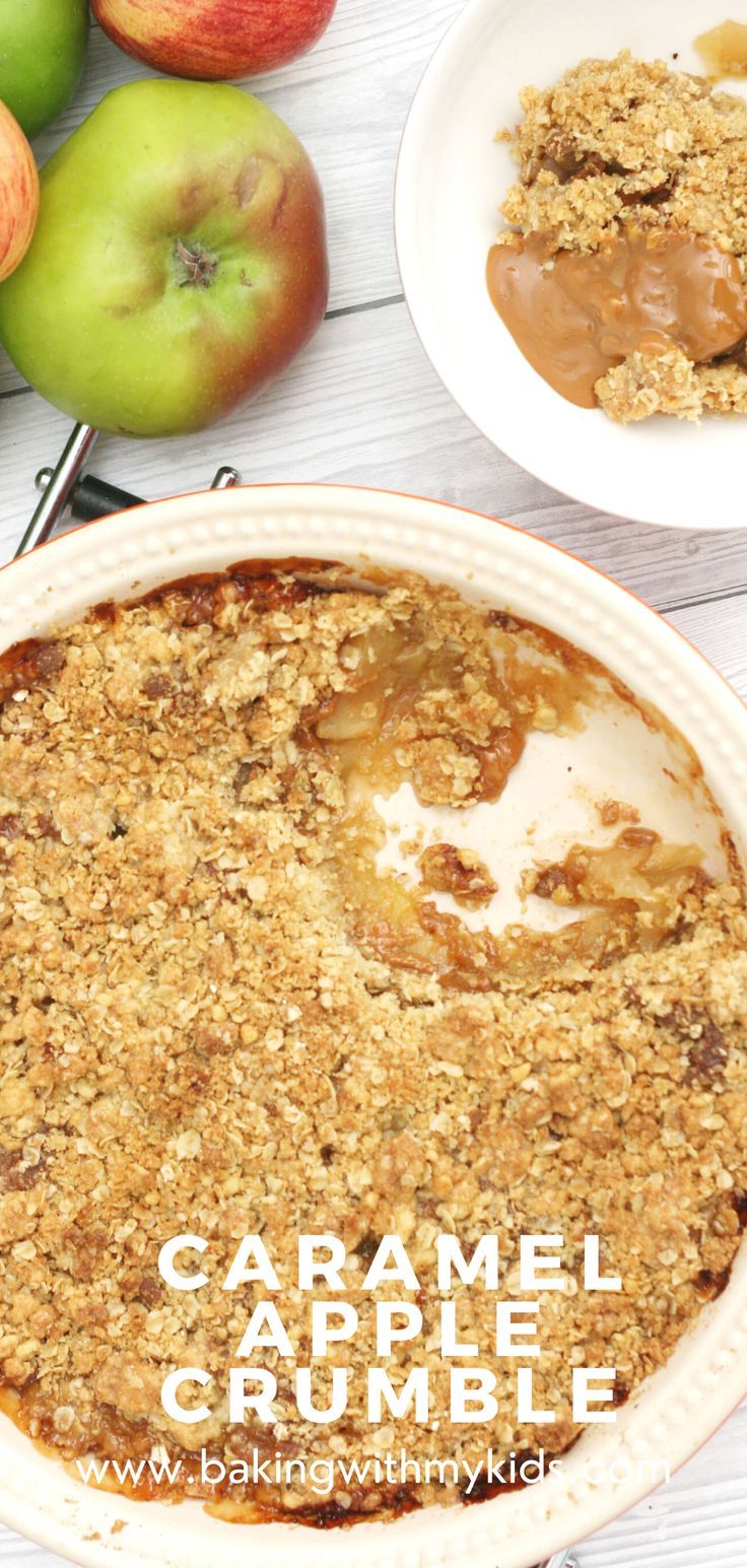 caramel apple crumble in a white dish next to apples