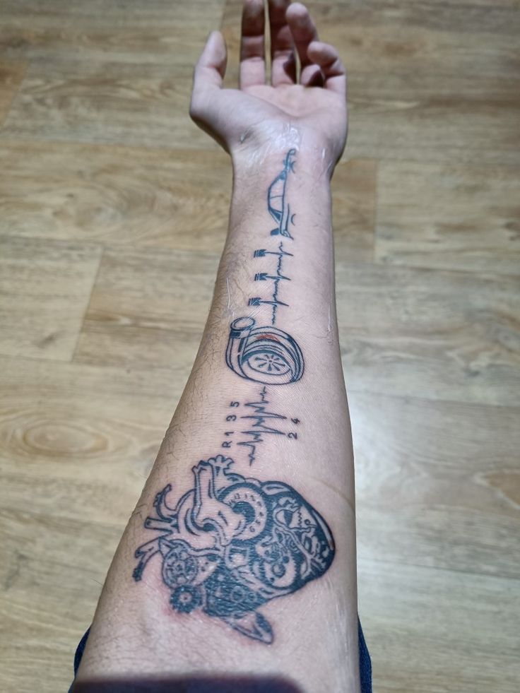 a person with a tattoo on their arm